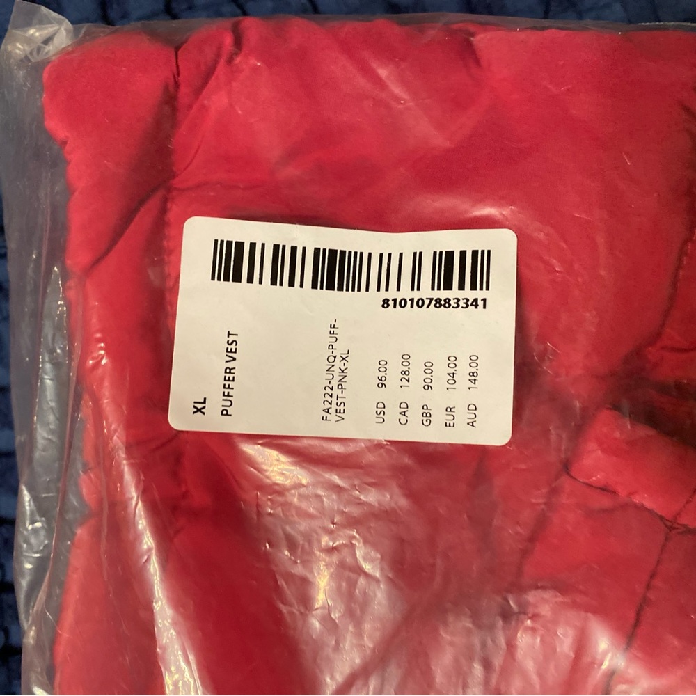 PELETON XL pink puffer vest